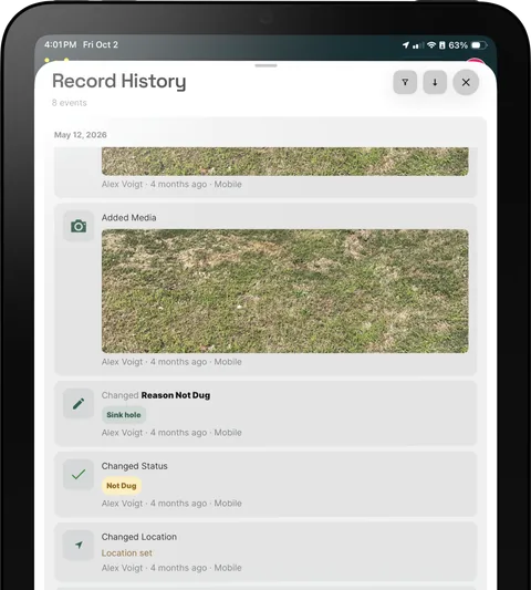 A tablet showing a record's history of edits and photos.